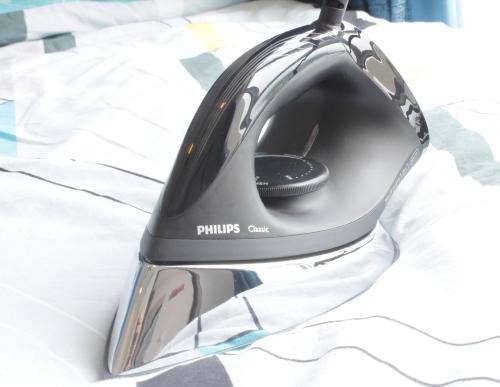 a black computer mouse sitting on top of a bed at H2H - Euro House @ Majestic Ipoh (8~10 Guests) in Ipoh