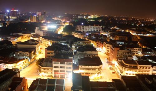 a view of a city at night with lights at H2H - Euro House @ Majestic Ipoh (8~10 Guests) in Ipoh