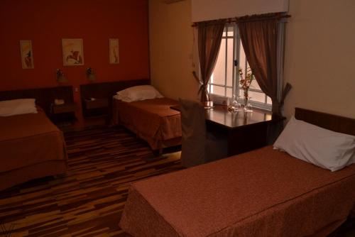 En eller flere senger på et rom på Solares Hotel & Spa