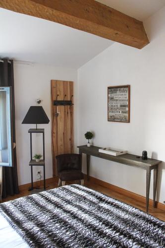 Postel nebo postele na pokoji v ubytování Bastide Pérassée