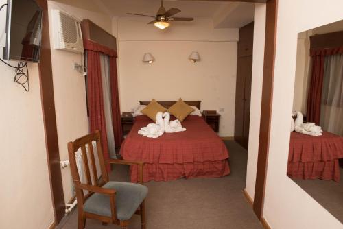 En eller flere senge i et værelse på Hotel Gran Litoral