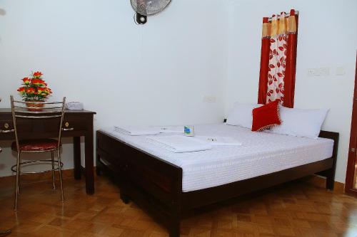 Postel nebo postele na pokoji v ubytování Marari Anandu Beach Villa