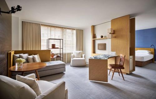 a living room with a couch and a table at Park Hyatt Washington in Washington, D.C.