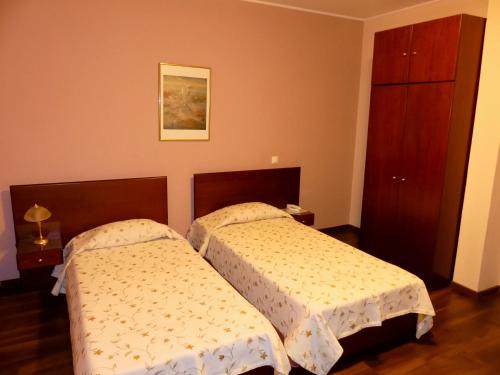 Postel nebo postele na pokoji v ubytování Vienni