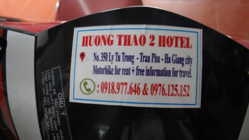a sign on the side of a parking meter at Huong Thao 2 Hotel in Ha Giang