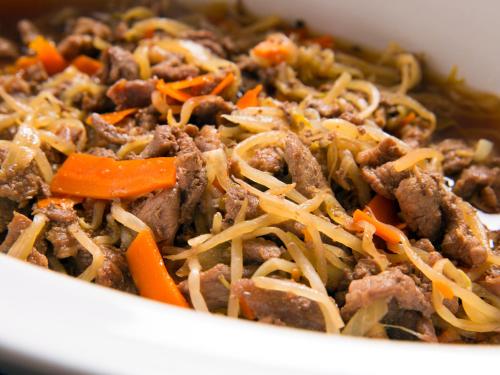 a bowl of food with meat and carrots at hotel miura kaen in Takikawa