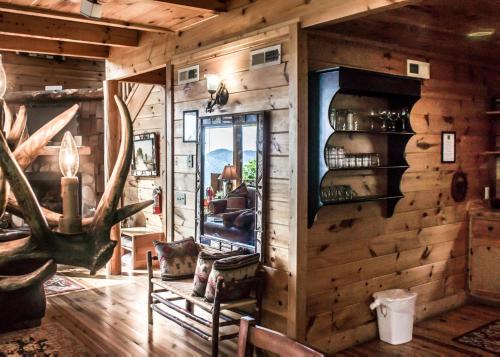 a room with a wooden wall with a window at Scenic Serenity #75 in Sevierville