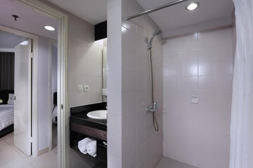 Kúpeľňa v ubytovaní Horison Ultima Suite & Residences Rasuna Jakarta