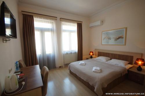 Llit o llits en una habitació de Hotel Mireosi