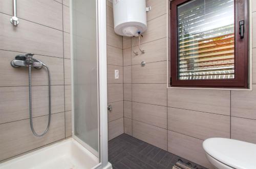 Kúpeľňa v ubytovaní Apartments Vedran