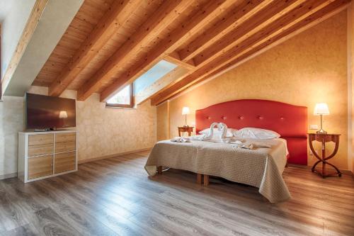 Postel nebo postele na pokoji v ubytování Lady Verona Residence