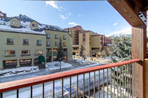 a view from the balcony of a hotel with snow on the ground at Der Steiermark in Breckenridge