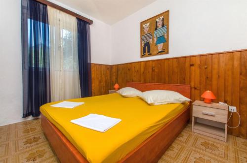 Postel nebo postele na pokoji v ubytování Apartment Ana