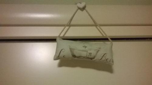 a drawing of a boat hanging on a wall at Anne's House in San Giuliano Terme