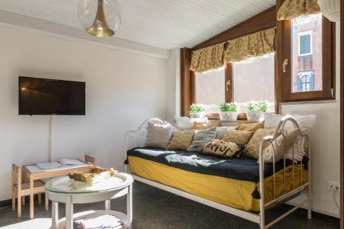 A bed or beds in a room at CASA DELL'ARTISTA