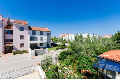 a view from the balcony of a apartment building at Apartments Valbruna in Rovinj