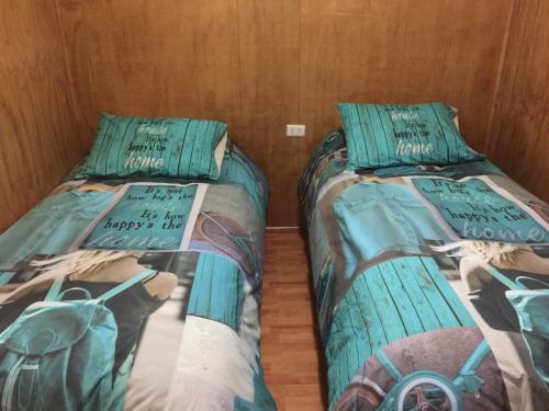 Cama o camas de una habitación en Cabañas las Bandurrias