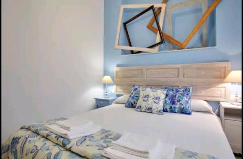 Posteľ alebo postele v izbe v ubytovaní Apartamento Alcazaba