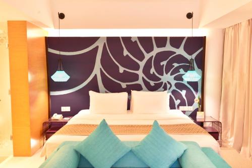 Krevet ili kreveti u jedinici u okviru objekta Hue Hotels and Resorts Boracay Managed by HII