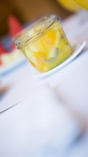 a glass jar of lemonade sitting on a plate at Mercure Carlton Rioja in Logroño