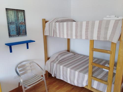 Cama o camas de una habitación en Punta Huanchaco Hostel