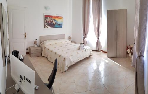 Postel nebo postele na pokoji v ubytování Il Giardino dei Limoni Room & Apartments