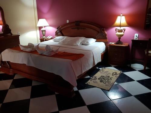 Katil atau katil-katil dalam bilik di Hotel Takana