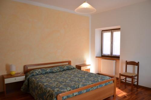 Ένα ή περισσότερα κρεβάτια σε δωμάτιο στο Casa Caritro