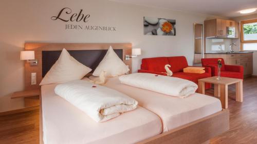 Łóżko lub łóżka w pokoju w obiekcie Studio Seeblick-Mohren