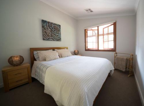 Ein Bett oder Betten in einem Zimmer der Unterkunft The Farmhouse