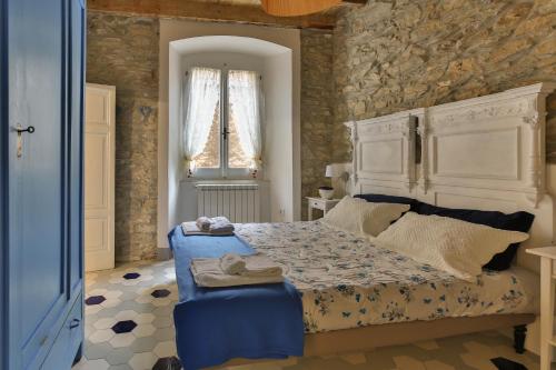 A bed or beds in a room at Mare amore @ Riomaggiore