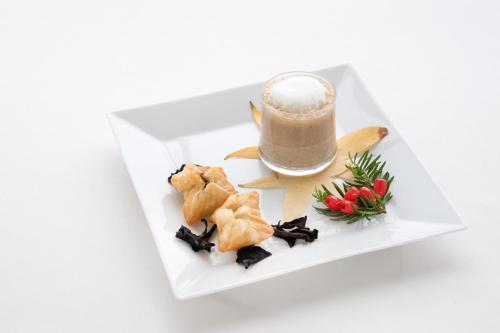 a plate of food with a cup of coffee at Gasthaus zum Bahnhof in Berg