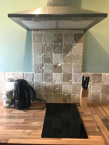 Η κουζίνα ή μικρή κουζίνα στο Somersall Park Studio
