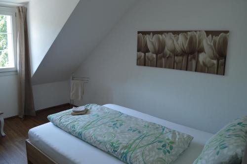 Postel nebo postele na pokoji v ubytování BnB zum Schlüssel