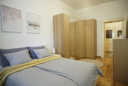 Postel nebo postele na pokoji v ubytování Apartment Centar