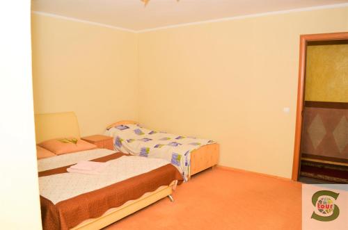 U Kvasu Hotelにあるベッド
