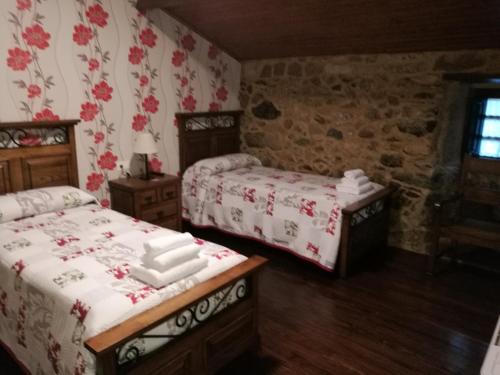 Ένα ή περισσότερα κρεβάτια σε δωμάτιο στο Casa de los Somoza