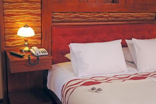 Katil atau katil-katil dalam bilik di Hotel Waynapicchu
