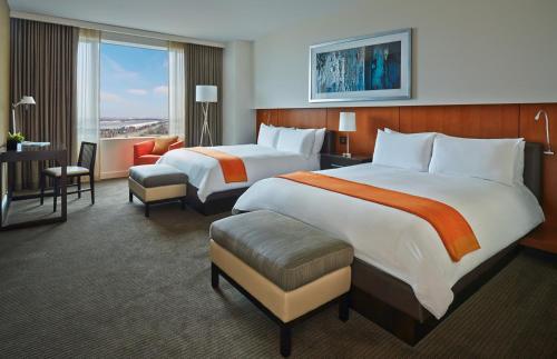 Ένα ή περισσότερα κρεβάτια σε δωμάτιο στο Hotel Arista