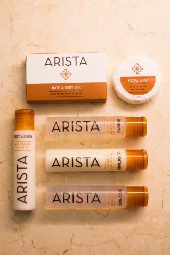 a group of four products on a table at Hotel Arista in Naperville