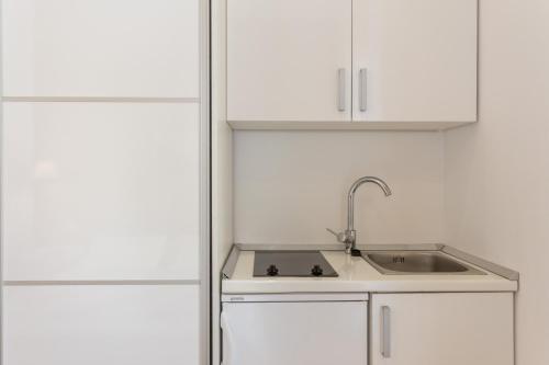 Kuchyň nebo kuchyňský kout v ubytování Apartments Villa Victoria 2