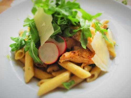 a white plate of food with pasta and vegetables at Pension Žacléřský Medvěd in Žacléř