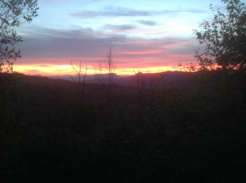 a sunset from the backyard of a house at Agriturismo Ca' di Mazza in Monzuno