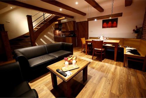 Posedenie v ubytovaní Apartments & Suites Žlutá Hruška