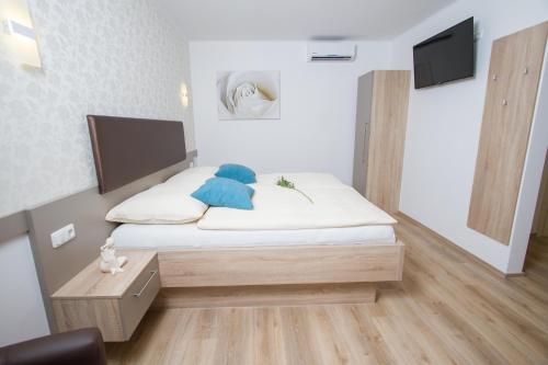 Postel nebo postele na pokoji v ubytování Appartments Gartenblick