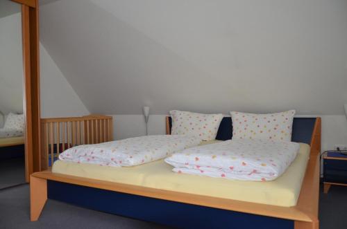 เตียงในห้องที่ Inselresidenz Seeschwalbe Langeoog