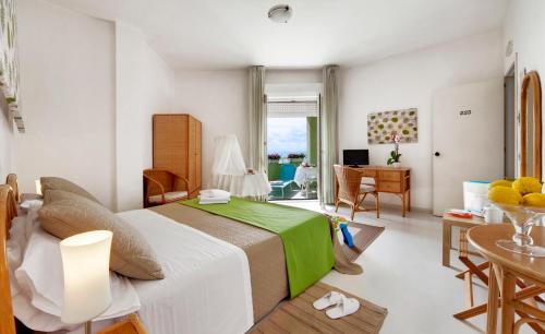 Hotel Midaにあるベッド