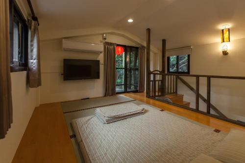 Zhou Ye Cottageにあるベッド