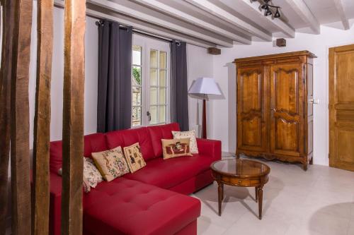 Ruang duduk di Petit loft de charme proche VERSAILLES SACLAY 30 mn PARIS jardin terrasse parking securisé