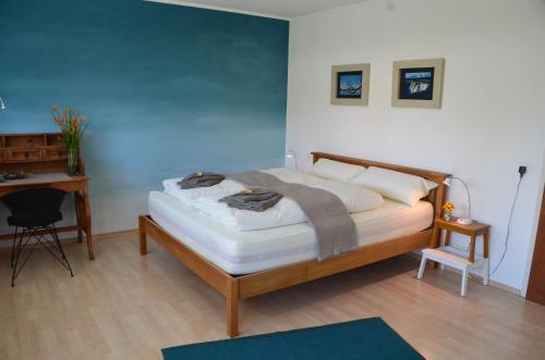 Postel nebo postele na pokoji v ubytování Lakelodge Romanshorn